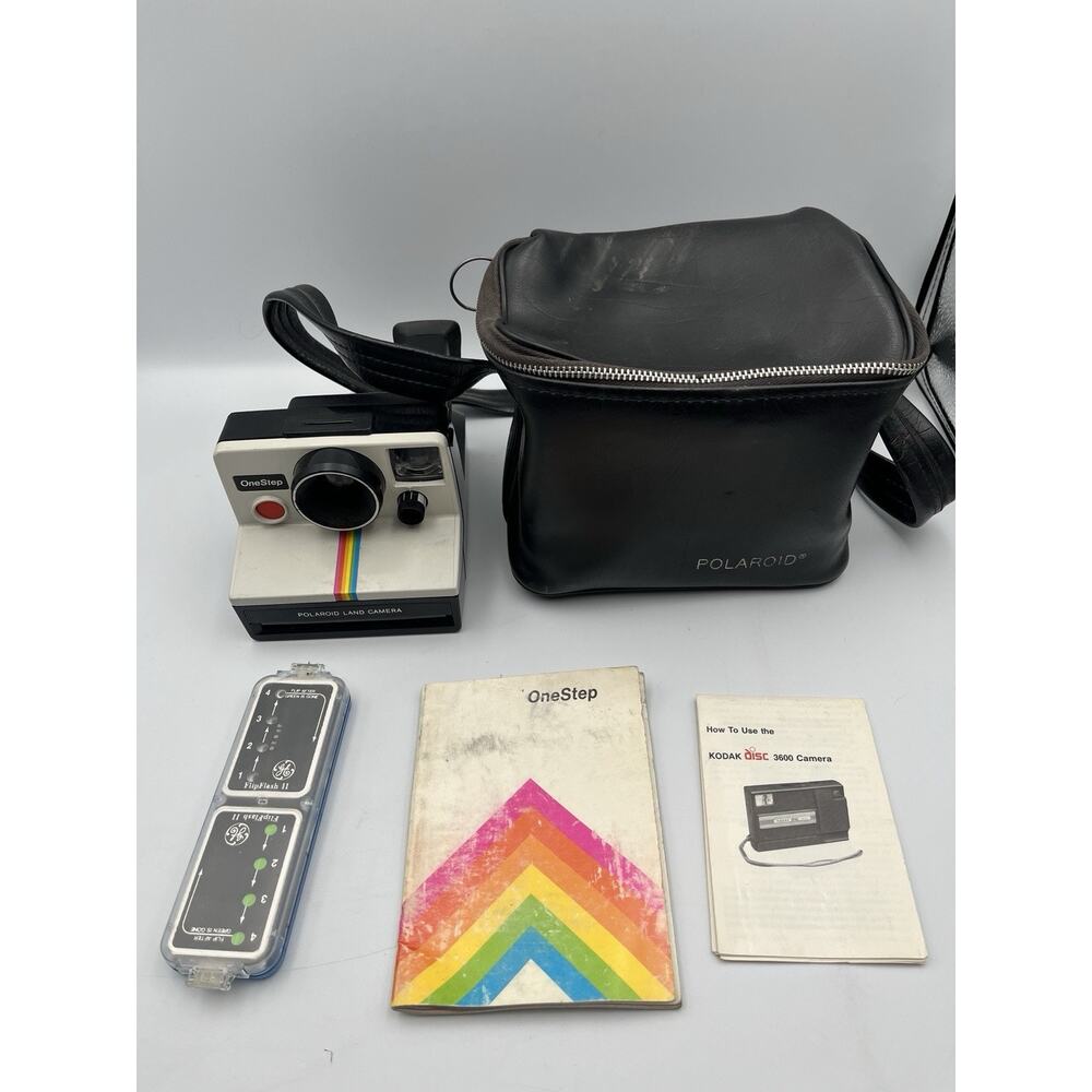 Vintage Polaroid One Step Land Camera With Manuals, Extra Flash, & Camera Bag